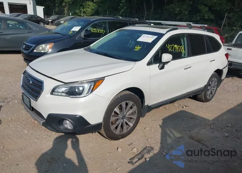 2017 Subaru Outback Touring z USA, uszkodzony, nr VIN 4S4BSATC4H3386989
